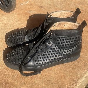 Black studded Christian Louboutin red bottoms